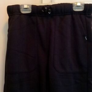 NEW GIRL'S BLACK JOGGING PANTS. SIZE MEDIUM